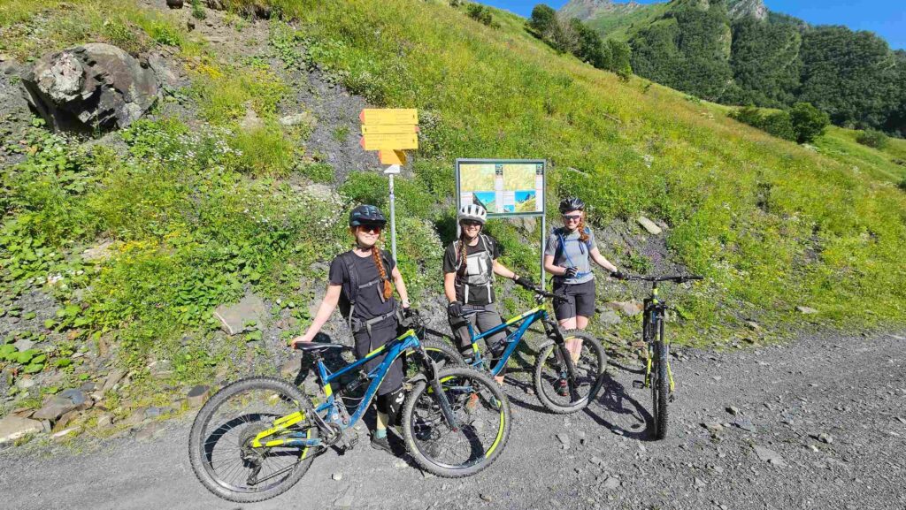 Reaching the trail junction signs high in the mountains.